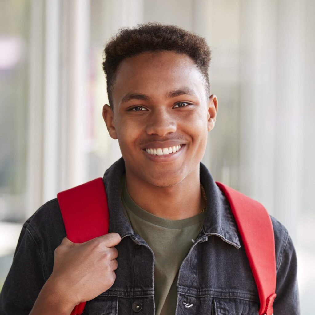 Landing portrait of smiling male university student with b 2024 10 19 05 42 11 utc.jpg